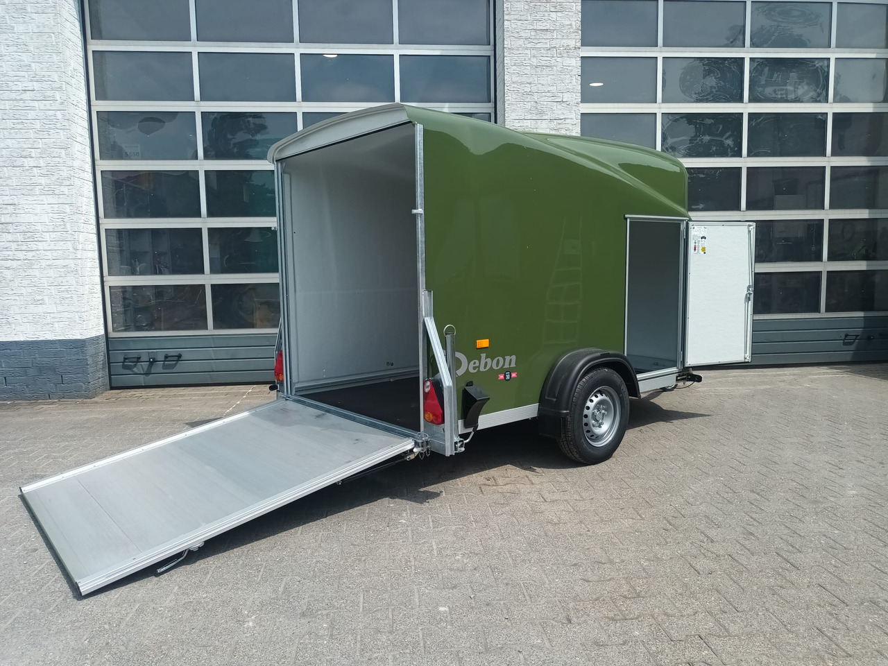 Debon Cargo 1300 300x152x168cm natur green Seitentür Pullman 1300kg 100km/H Juli Aktion 2025 - Automobilinė priekaba: foto 1 Debon Cargo 1300 300x152x168cm natur green Seitentür Pullman 1300kg 100km/H Juli Aktion 2025 - Automobilinė priekaba: foto 1