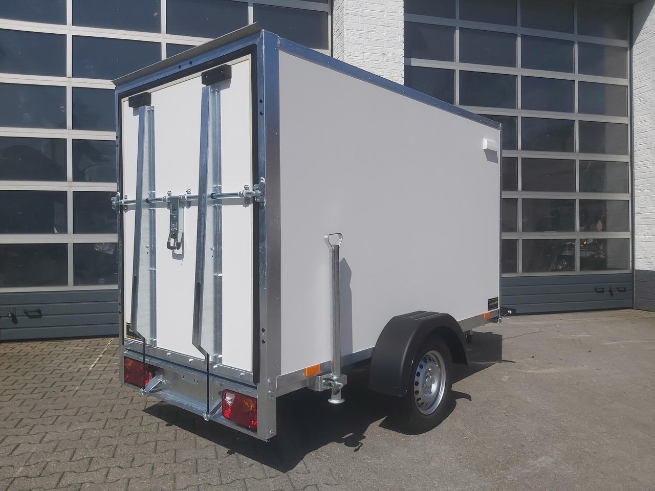 Kargo TFD 250.00 250x125x150cm Zurrsystem Heckrampe (S) 100km/H 750kg - Motociklo priekaba: foto 2 Kargo TFD 250.00 250x125x150cm Zurrsystem Heckrampe (S) 100km/H 750kg - Motociklo priekaba: foto 2