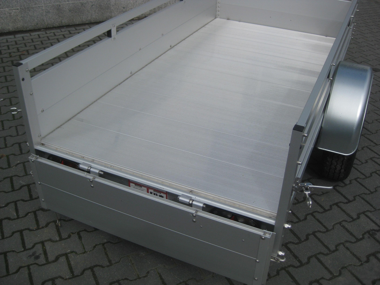 PKW Anhänger Koch Aluline+ 4.13 250x125x44cm ALUBODEN (S) 1300kg 100 km/H Online Abverkauf - Automobilinė priekaba: foto 5 PKW Anhänger Koch Aluline+ 4.13 250x125x44cm ALUBODEN (S) 1300kg 100 km/H Online Abverkauf - Automobilinė priekaba: foto 5