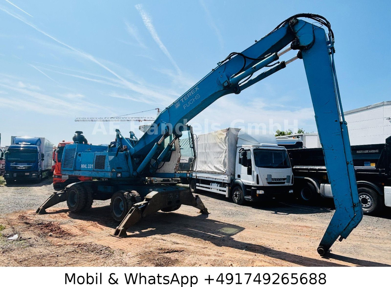 Terex MHL 331 Umschlagbagger - Ratinis ekskavatorius: foto 1 Terex MHL 331 Umschlagbagger - Ratinis ekskavatorius: foto 1