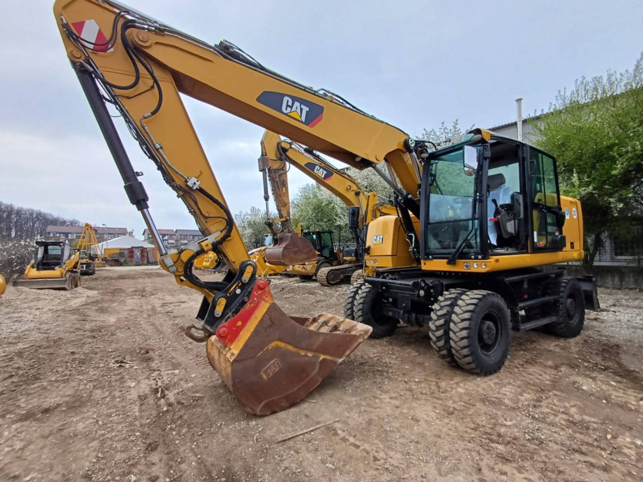 CAT M318F - Ratinis ekskavatorius: foto 1 CAT M318F - Ratinis ekskavatorius: foto 1