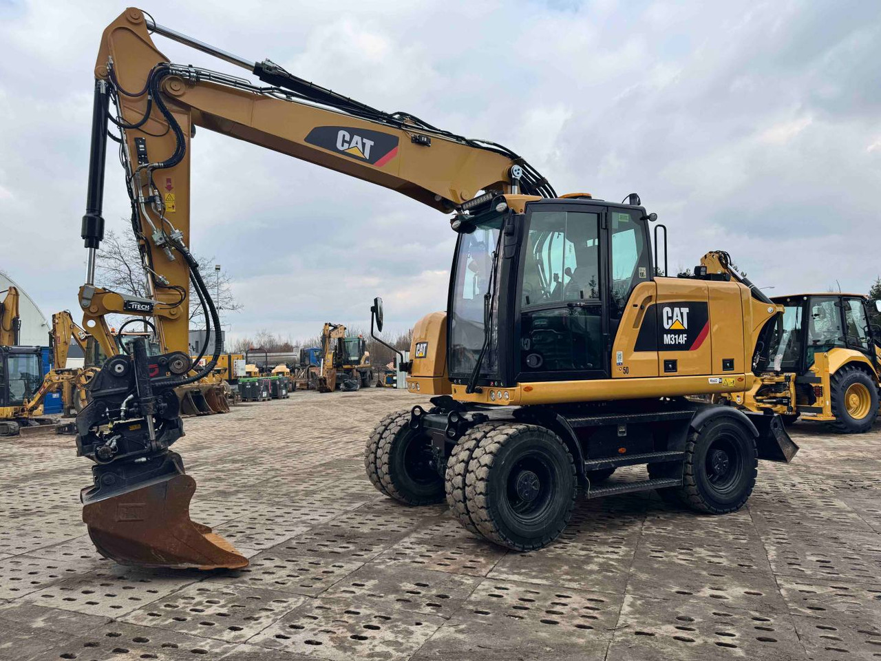 CAT M314F - Ratinis ekskavatorius: foto 1 CAT M314F - Ratinis ekskavatorius: foto 1