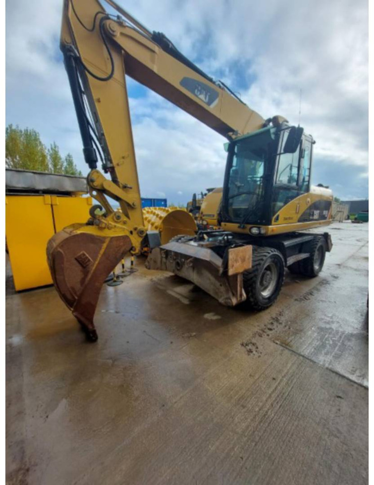 CAT M315D - Ratinis ekskavatorius: foto 1 CAT M315D - Ratinis ekskavatorius: foto 1