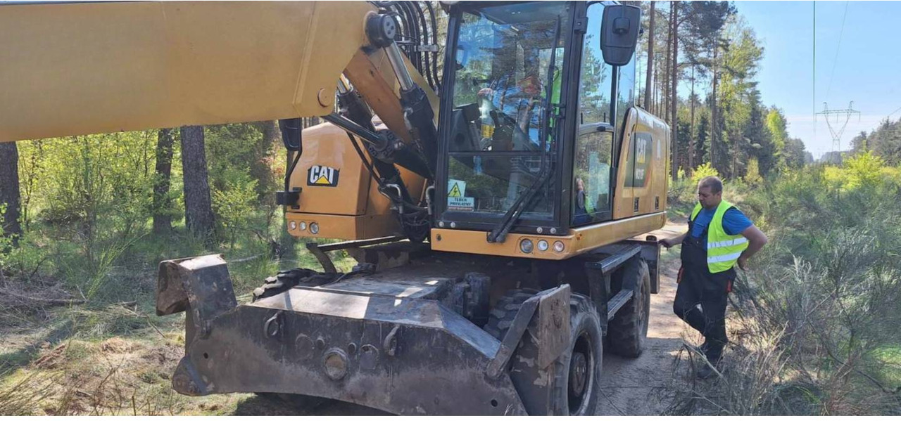CAT M318F - Ratinis ekskavatorius: foto 1 CAT M318F - Ratinis ekskavatorius: foto 1