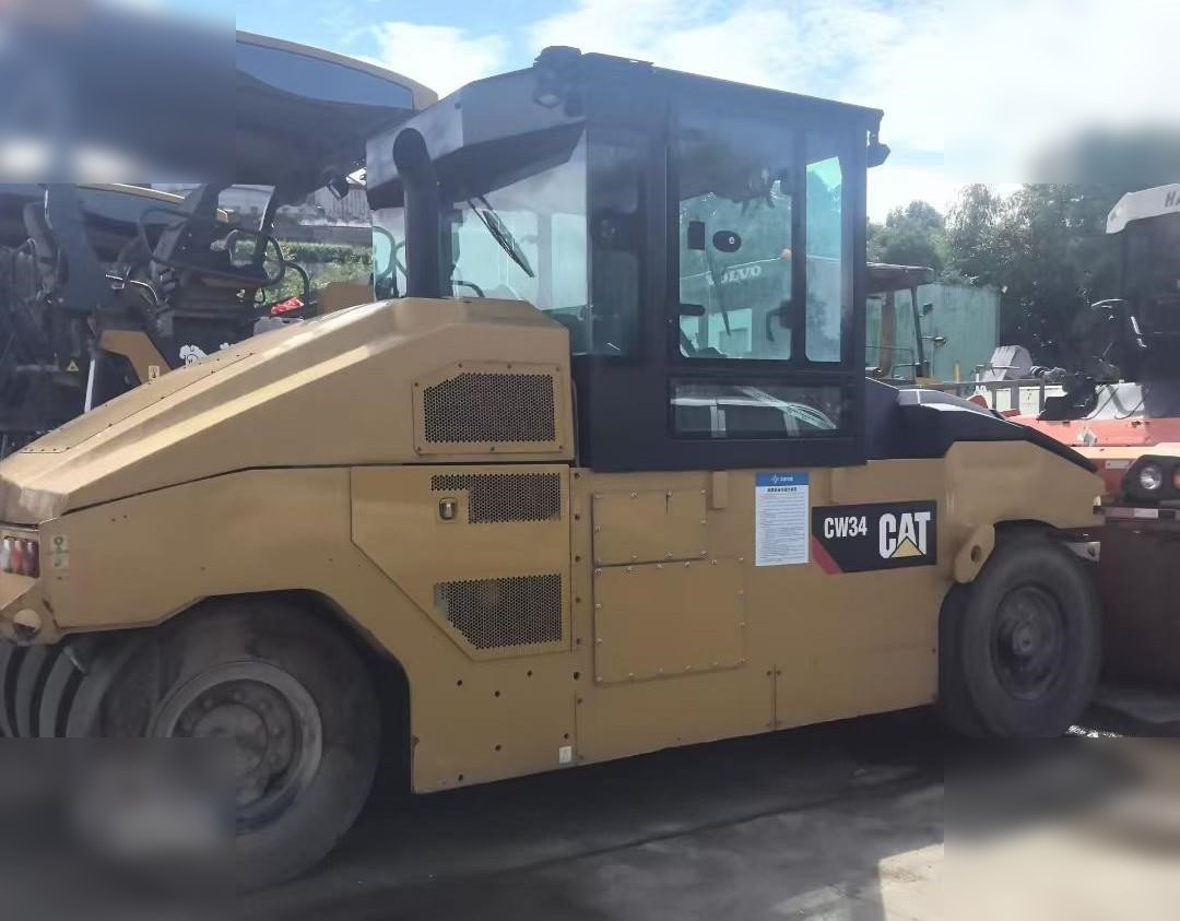 2019 CATERPILLAR CW34 - Pneumatinis volas: foto 1 2019 CATERPILLAR CW34 - Pneumatinis volas: foto 1