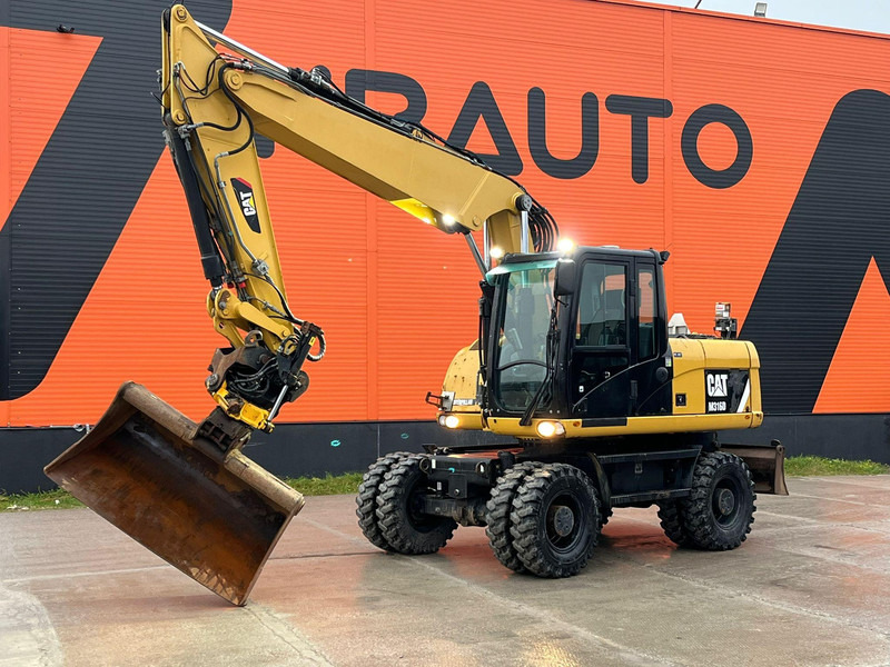 Caterpillar M316D / ROTOTILT/ AC / CENTRAL LUBRICATION / + EXTRA BUCKET - Ratinis ekskavatorius: foto 1 Caterpillar M316D / ROTOTILT/ AC / CENTRAL LUBRICATION / + EXTRA BUCKET - Ratinis ekskavatorius: foto 1
