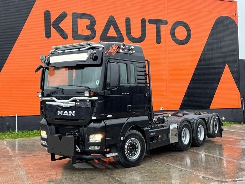 MAN TGX 35.560 8x4*4 LOW MILEAGE ! / INTARDER / JOAB 24 ton / L=5600 mm / SNOW PLOW EQUIPMENT - Hook-lift sunkvežimis: foto 1 MAN TGX 35.560 8x4*4 LOW MILEAGE ! / INTARDER / JOAB 24 ton / L=5600 mm / SNOW PLOW EQUIPMENT - Hook-lift sunkvežimis: foto 1