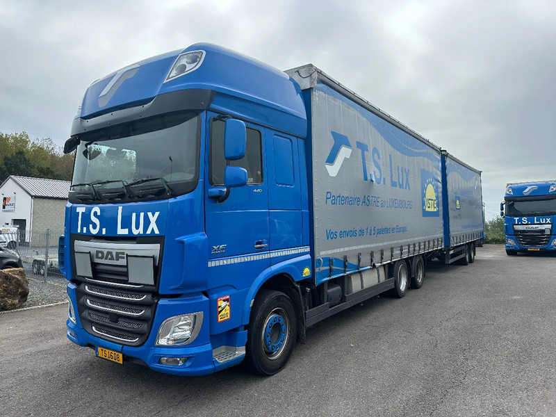 DAF XF 440 6x2 / SUPERSPACECAB / KOMBI MIT ANHANGER SCHMITZ 2016 / DURCHLADEN / 2 STUCK - Tentinis sunkvežimis: foto 1 DAF XF 440 6x2 / SUPERSPACECAB / KOMBI MIT ANHANGER SCHMITZ 2016 / DURCHLADEN / 2 STUCK - Tentinis sunkvežimis: foto 1