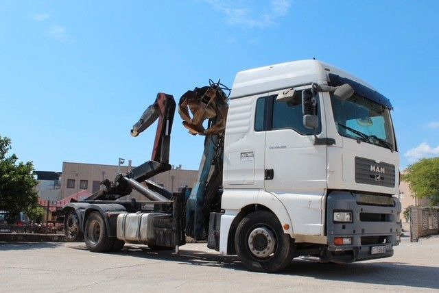 MAN TGA 26.360 FG 6x2 LL GERGEN Abroll + Penz Kran - Hook-lift sunkvežimis, Sunkvežimis su kranu: foto 1 MAN TGA 26.360 FG 6x2 LL GERGEN Abroll + Penz Kran - Hook-lift sunkvežimis, Sunkvežimis su kranu: foto 1