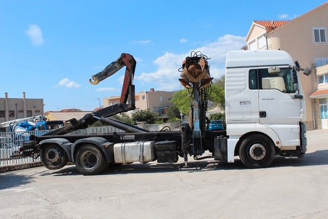MAN TGA 26.360 FG 6x2 LL GERGEN Abroll + Penz Kran - Hook-lift sunkvežimis, Sunkvežimis su kranu: foto 2 MAN TGA 26.360 FG 6x2 LL GERGEN Abroll + Penz Kran - Hook-lift sunkvežimis, Sunkvežimis su kranu: foto 2