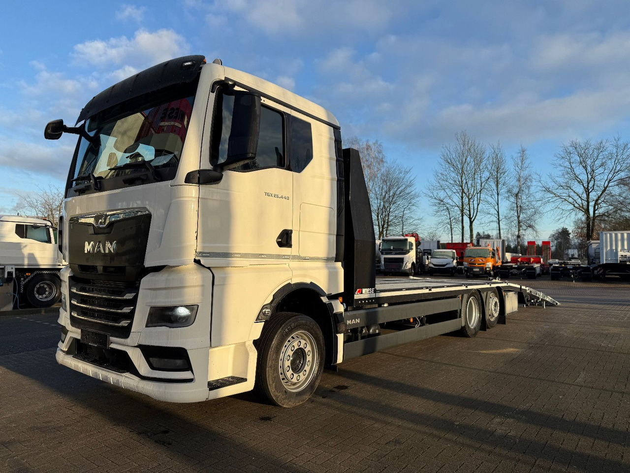 MAN Baumaschinen- Arbeitsbühnentransporter Rampen - Platforminis/ Bortinis sunkvežimis: foto 4 MAN Baumaschinen- Arbeitsbühnentransporter Rampen - Platforminis/ Bortinis sunkvežimis: foto 4