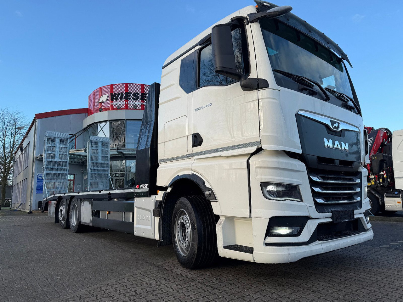 MAN Baumaschinen-  Arbeitsbühnentransporter Rampen - Evakuatorius: foto 2 MAN Baumaschinen-  Arbeitsbühnentransporter Rampen - Evakuatorius: foto 2