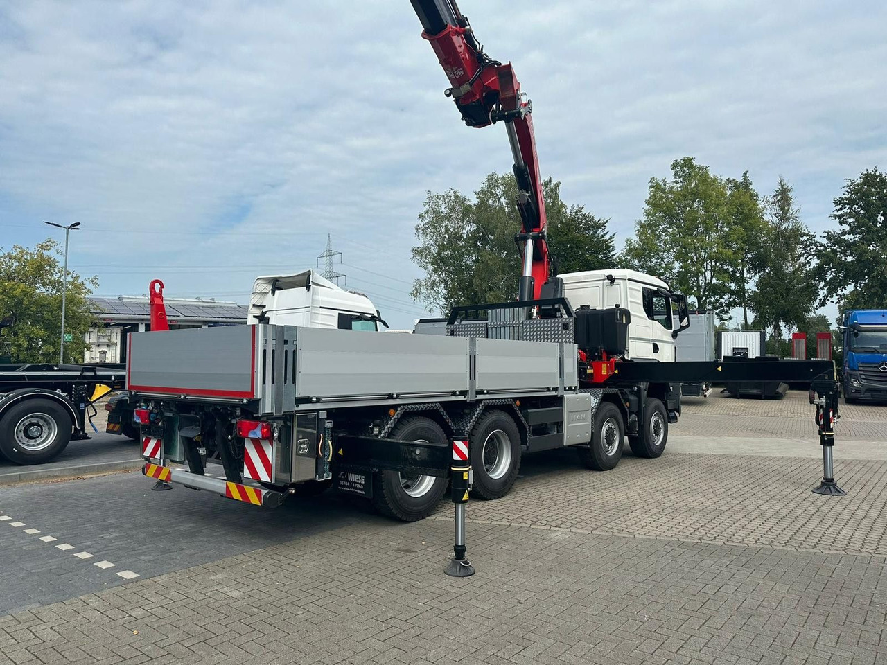 MAN TGS 41.520 8x8 mit Fassi Ladekran F710RA.2.26 - Platforminis/ Bortinis sunkvežimis: foto 3 MAN TGS 41.520 8x8 mit Fassi Ladekran F710RA.2.26 - Platforminis/ Bortinis sunkvežimis: foto 3