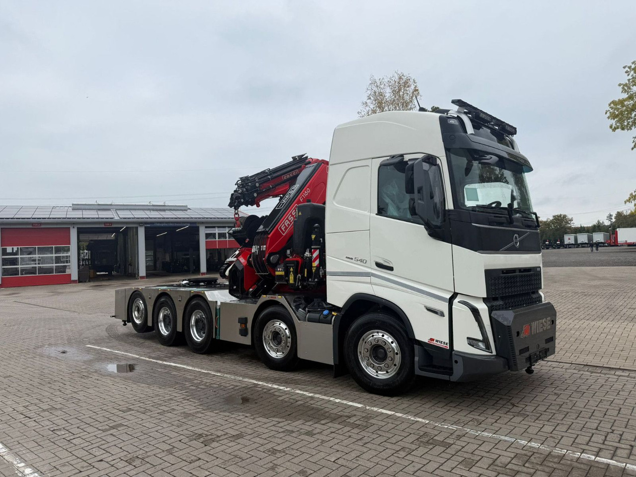 Volvo FH540 10x4 mit F1150 Ladekran, Sattelzugmaschine - Platforminis/ Bortinis sunkvežimis, Sunkvežimis su kranu: foto 1 Volvo FH540 10x4 mit F1150 Ladekran, Sattelzugmaschine - Platforminis/ Bortinis sunkvežimis, Sunkvežimis su kranu: foto 1