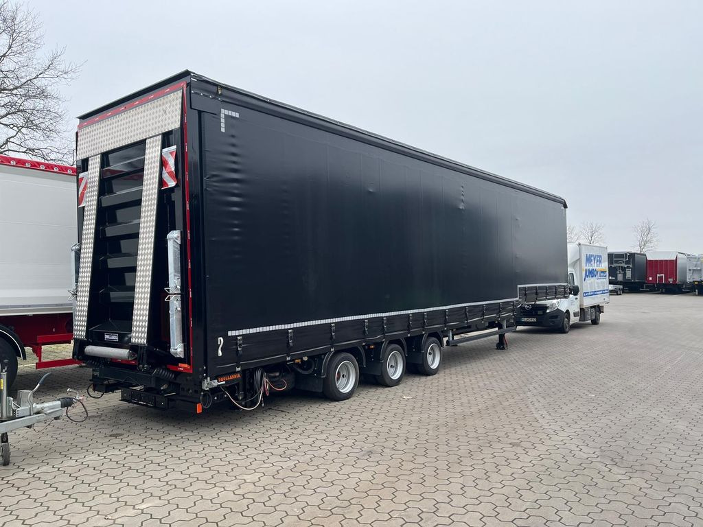 Wiese Gabelstaplertransporter Mega mit Rampen - Žemo profilio platforma puspriekabė: foto 1 Wiese Gabelstaplertransporter Mega mit Rampen - Žemo profilio platforma puspriekabė: foto 1
