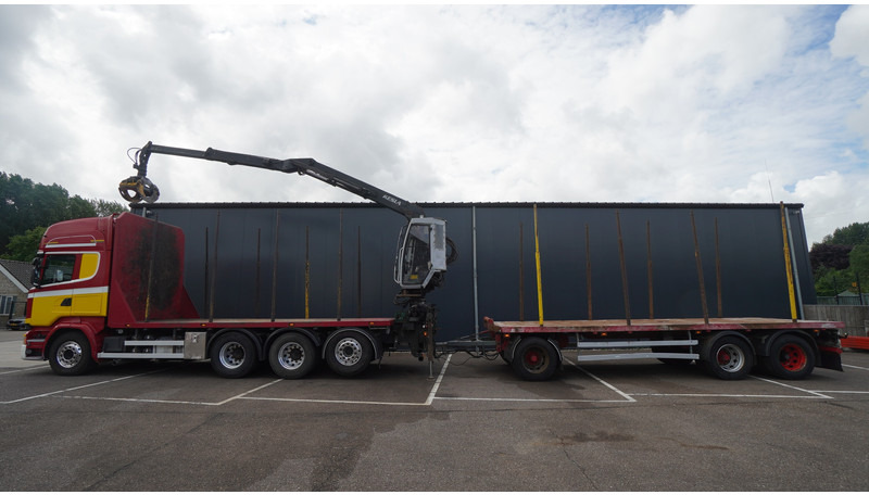 Scania R 580 V8 8X4 LOGTRANSPORT COMBI WITH MTDK YEAR 2012 TRAILER KESLA 46 CRANE - Miškovežis, Sunkvežimis su kranu: foto 1 Scania R 580 V8 8X4 LOGTRANSPORT COMBI WITH MTDK YEAR 2012 TRAILER KESLA 46 CRANE - Miškovežis, Sunkvežimis su kranu: foto 1