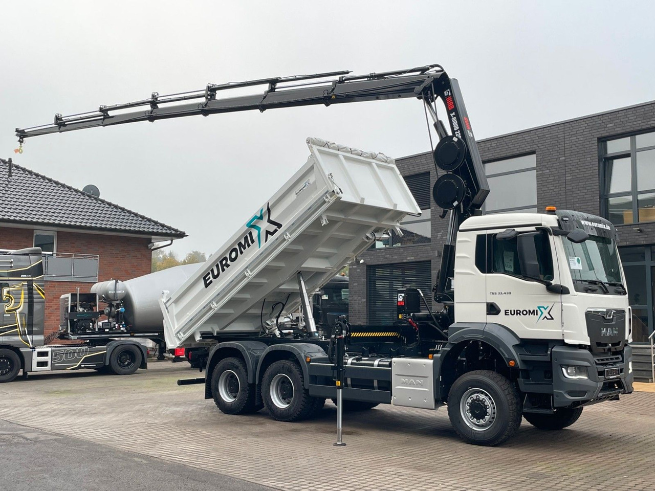MAN TGS 33.440 6x6 /3-Seiten- Kipper / HIAB 228-6 - Savivartis sunkvežimis, Sunkvežimis su kranu: foto 1 MAN TGS 33.440 6x6 /3-Seiten- Kipper / HIAB 228-6 - Savivartis sunkvežimis, Sunkvežimis su kranu: foto 1