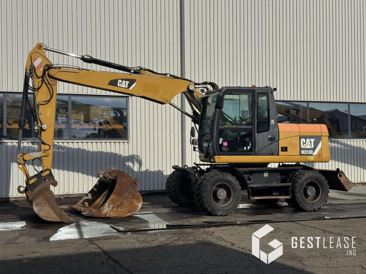 Caterpillar M313D - Ratinis ekskavatorius: foto 1 Caterpillar M313D - Ratinis ekskavatorius: foto 1