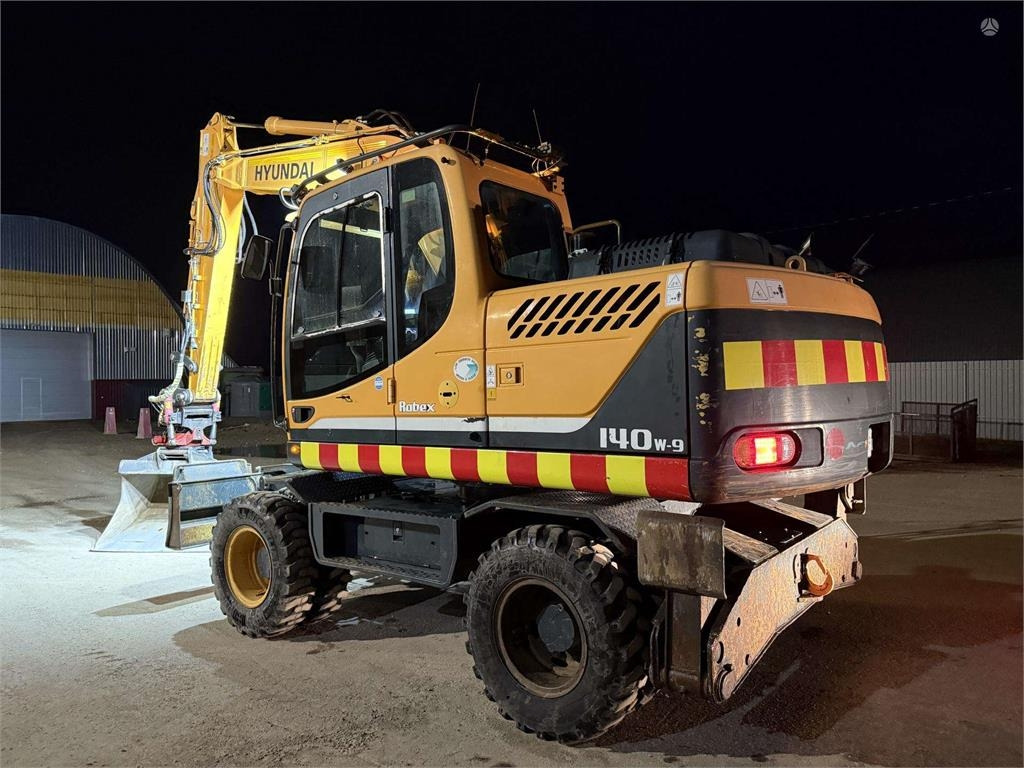 Hyundai Robex 140 W-9 ROTOTILT - Ratinis ekskavatorius: foto 3 Hyundai Robex 140 W-9 ROTOTILT - Ratinis ekskavatorius: foto 3