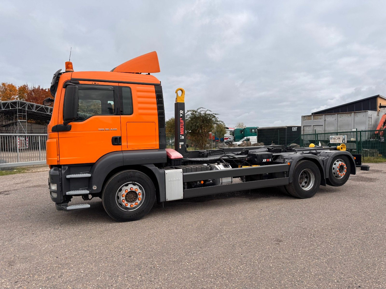 MAN 26.40 6X2 Multilift Abroller - Hook-lift sunkvežimis: foto 1 MAN 26.40 6X2 Multilift Abroller - Hook-lift sunkvežimis: foto 1