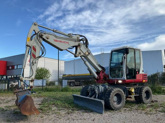 Takeuchi TB295W - Ratinis ekskavatorius: foto 1 Takeuchi TB295W - Ratinis ekskavatorius: foto 1
