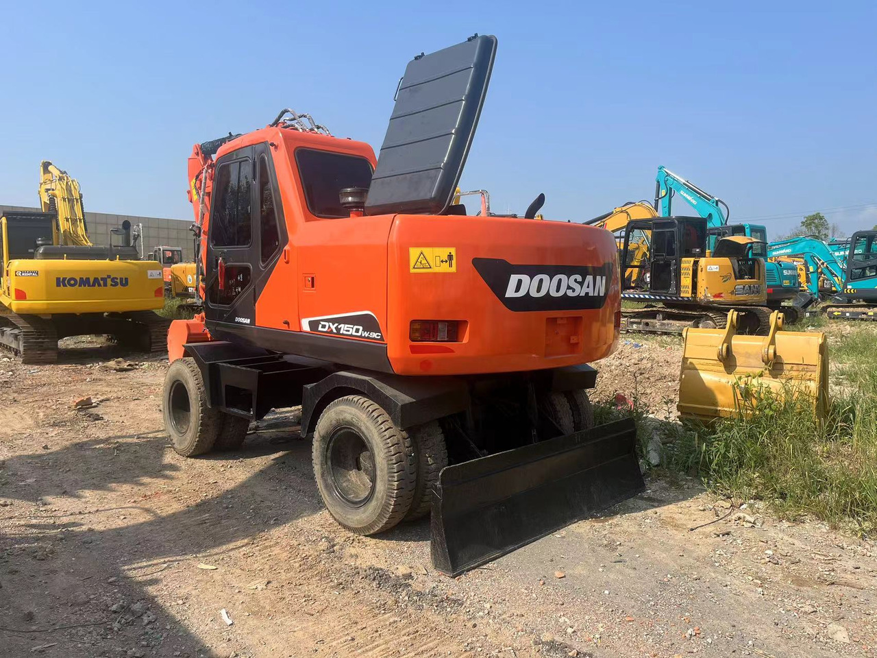 Doosan DX150W-9C - Ratinis ekskavatorius: foto 4 Doosan DX150W-9C - Ratinis ekskavatorius: foto 4