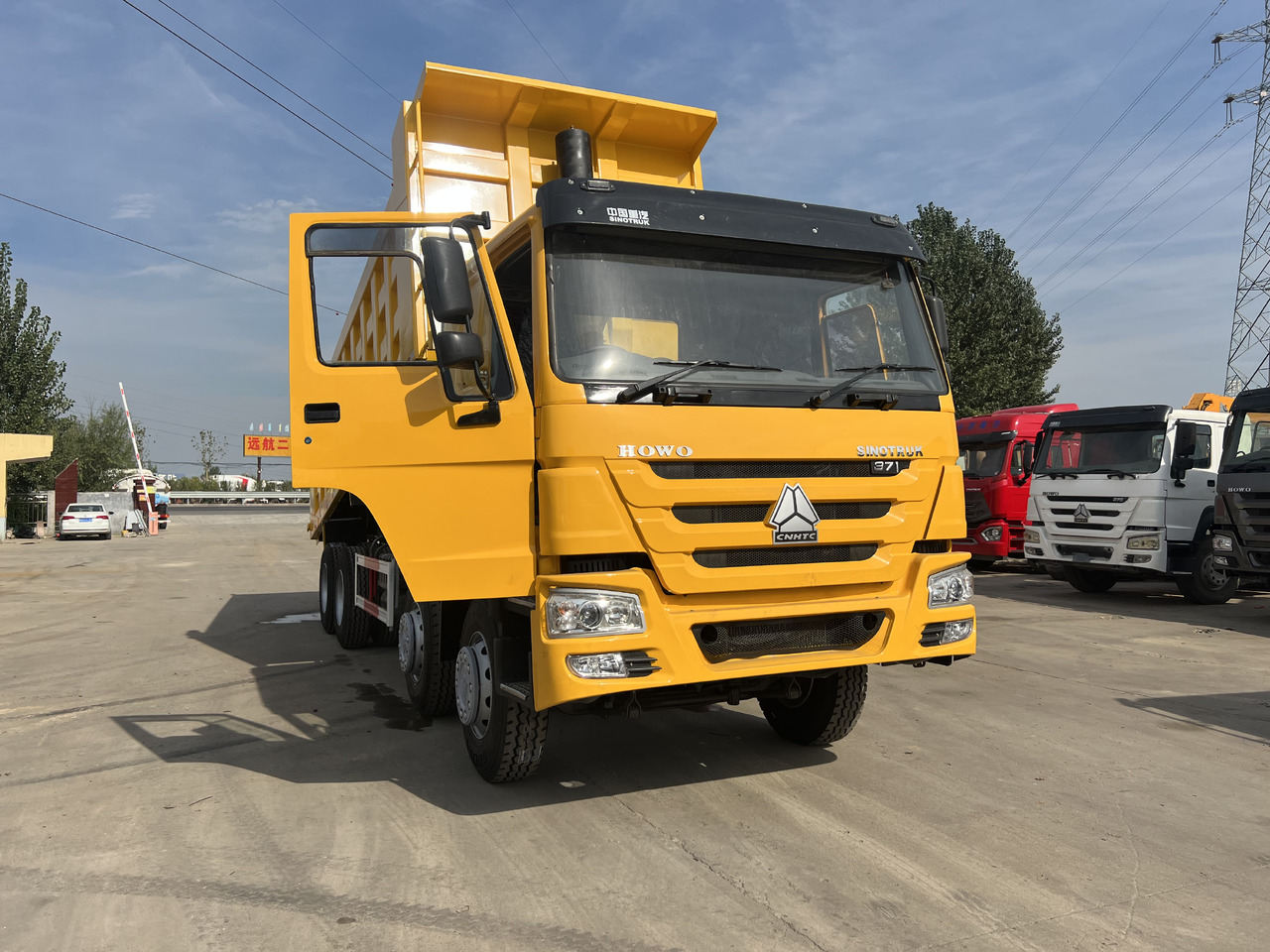 SINOTRUK HOWO 8*4 RHD - Savivartis sunkvežimis: foto 4 SINOTRUK HOWO 8*4 RHD - Savivartis sunkvežimis: foto 4