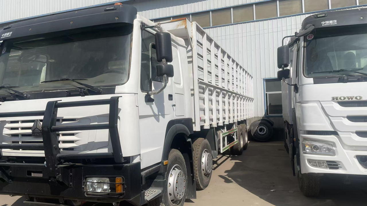 SINOTRUK HOWO 8*4 WITH FENCE DUMP TRUCK LIVESTOCK TRUCK - Savivartis sunkvežimis: foto 3 SINOTRUK HOWO 8*4 WITH FENCE DUMP TRUCK LIVESTOCK TRUCK - Savivartis sunkvežimis: foto 3