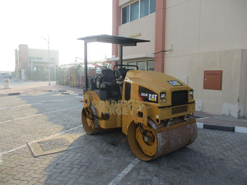 Caterpillar CB34B Tandem Roller - Tankinimo volas: foto 1 Caterpillar CB34B Tandem Roller - Tankinimo volas: foto 1