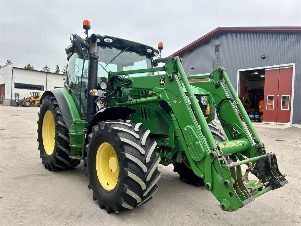 John Deere 6125 R AUTOPOWER ETUKUORMAAJALLA  - Traktorius: foto 4 John Deere 6125 R AUTOPOWER ETUKUORMAAJALLA  - Traktorius: foto 4