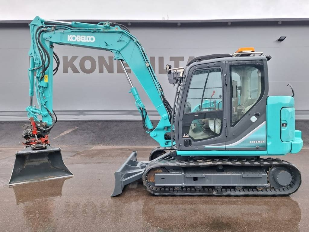 Mini ekskavatorius Kobelco SK85MSR-3 PYÖRITTÄJÄLLÄ: foto 1