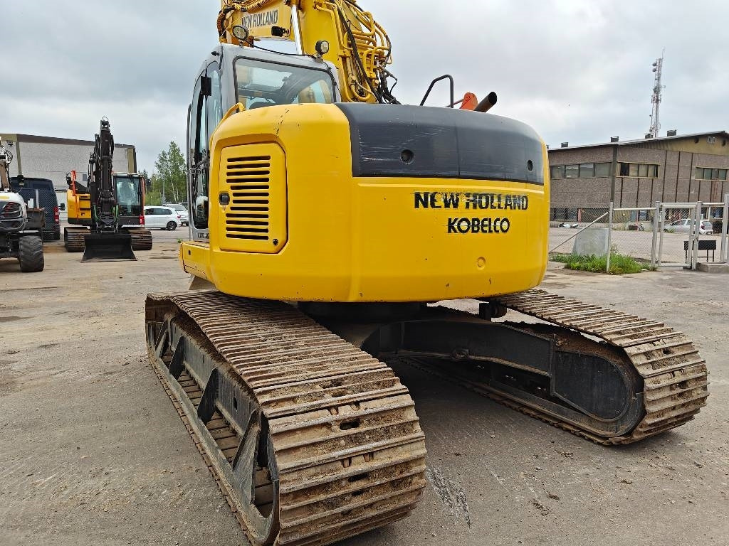 New Holland E200SRLC KALLISTUVA KAUHA - Vikšrinis ekskavatorius: foto 3 New Holland E200SRLC KALLISTUVA KAUHA - Vikšrinis ekskavatorius: foto 3