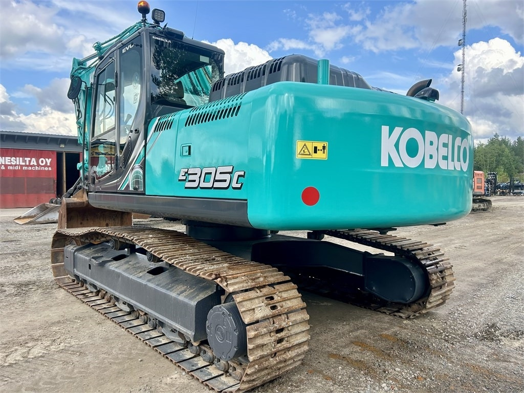 New Holland Kobelco E305C EVO - Vikšrinis ekskavatorius: foto 5 New Holland Kobelco E305C EVO - Vikšrinis ekskavatorius: foto 5
