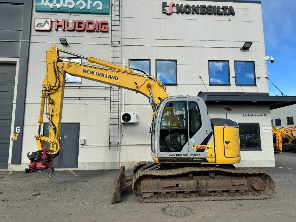 New Holland MYYTY! SOLD! E135BSR-2 PYÖRITTÄJÄLLÄ - Vikšrinis ekskavatorius: foto 1 New Holland MYYTY! SOLD! E135BSR-2 PYÖRITTÄJÄLLÄ - Vikšrinis ekskavatorius: foto 1