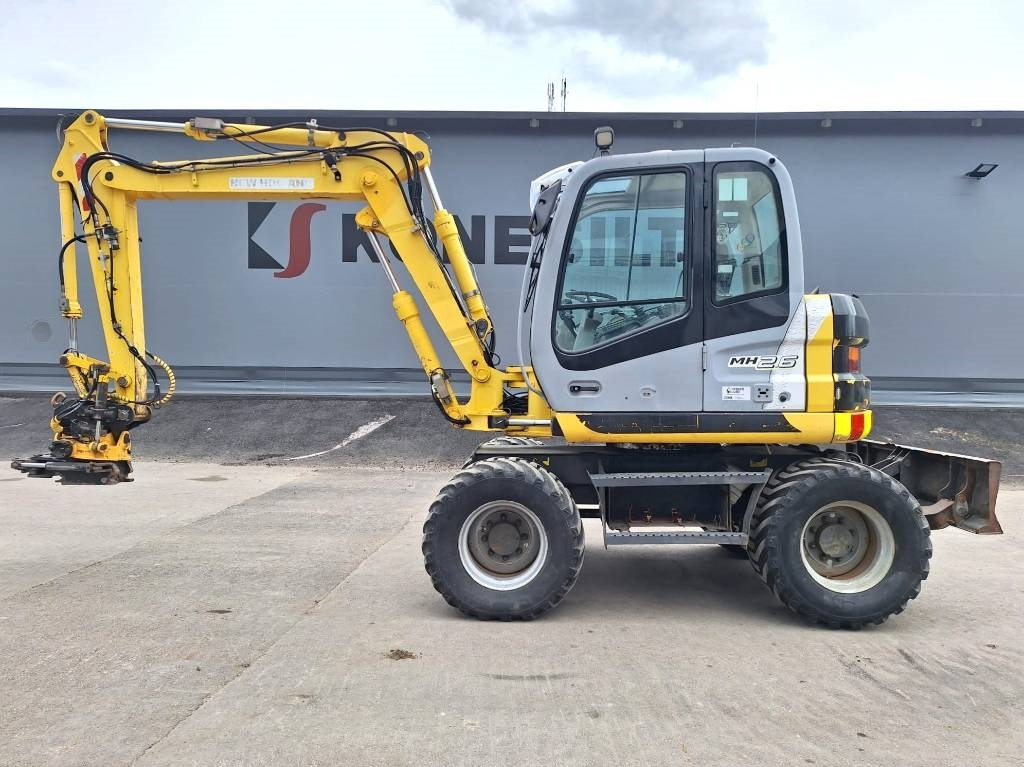 New Holland MYYTY! SOLD! MH2.6 ENGCON PIHDEILLÄ - Ratinis ekskavatorius: foto 1 New Holland MYYTY! SOLD! MH2.6 ENGCON PIHDEILLÄ - Ratinis ekskavatorius: foto 1