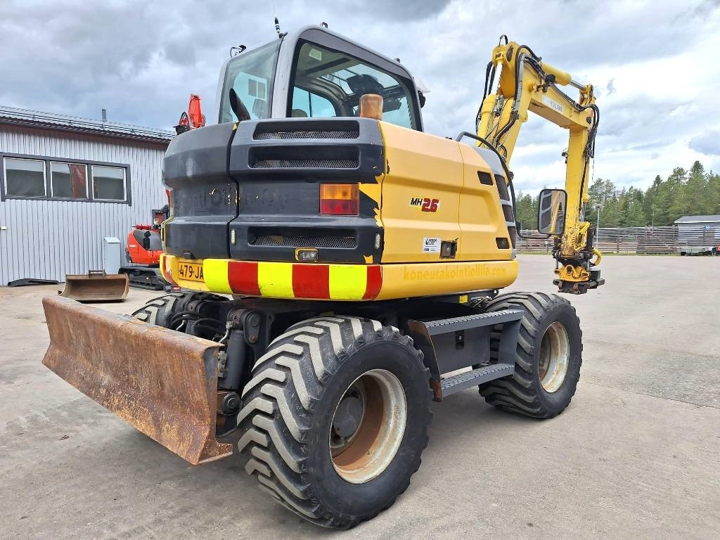 New Holland MYYTY! SOLD! MH2.6 ENGCON PIHDEILLÄ - Ratinis ekskavatorius: foto 4 New Holland MYYTY! SOLD! MH2.6 ENGCON PIHDEILLÄ - Ratinis ekskavatorius: foto 4