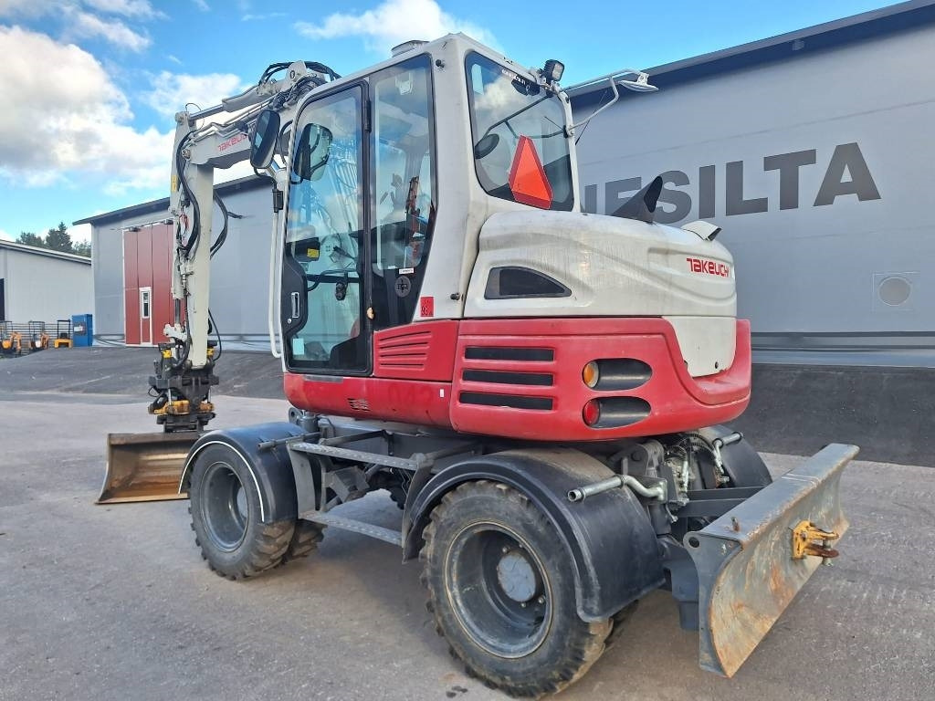 Takeuchi TB295W PYÖRITTÄJÄLLÄ - Ratinis ekskavatorius: foto 2 Takeuchi TB295W PYÖRITTÄJÄLLÄ - Ratinis ekskavatorius: foto 2