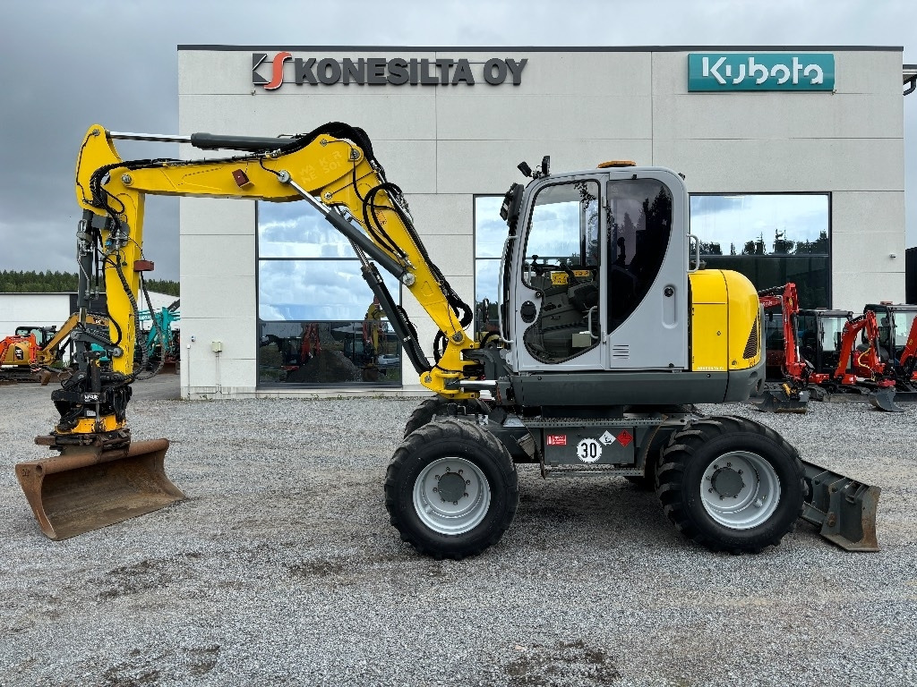 Wacker Neuson EW 100 - Ratinis ekskavatorius: foto 1 Wacker Neuson EW 100 - Ratinis ekskavatorius: foto 1