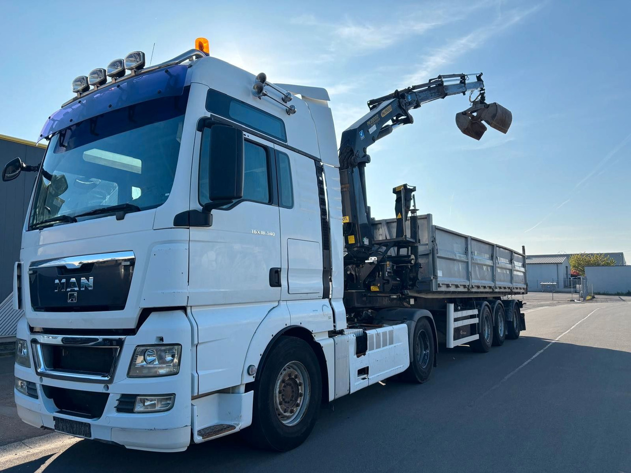 MAN TGX 18.540. Kipper + Kran PK20002. - Sunkvežimis su kranu: foto 2 MAN TGX 18.540. Kipper + Kran PK20002. - Sunkvežimis su kranu: foto 2