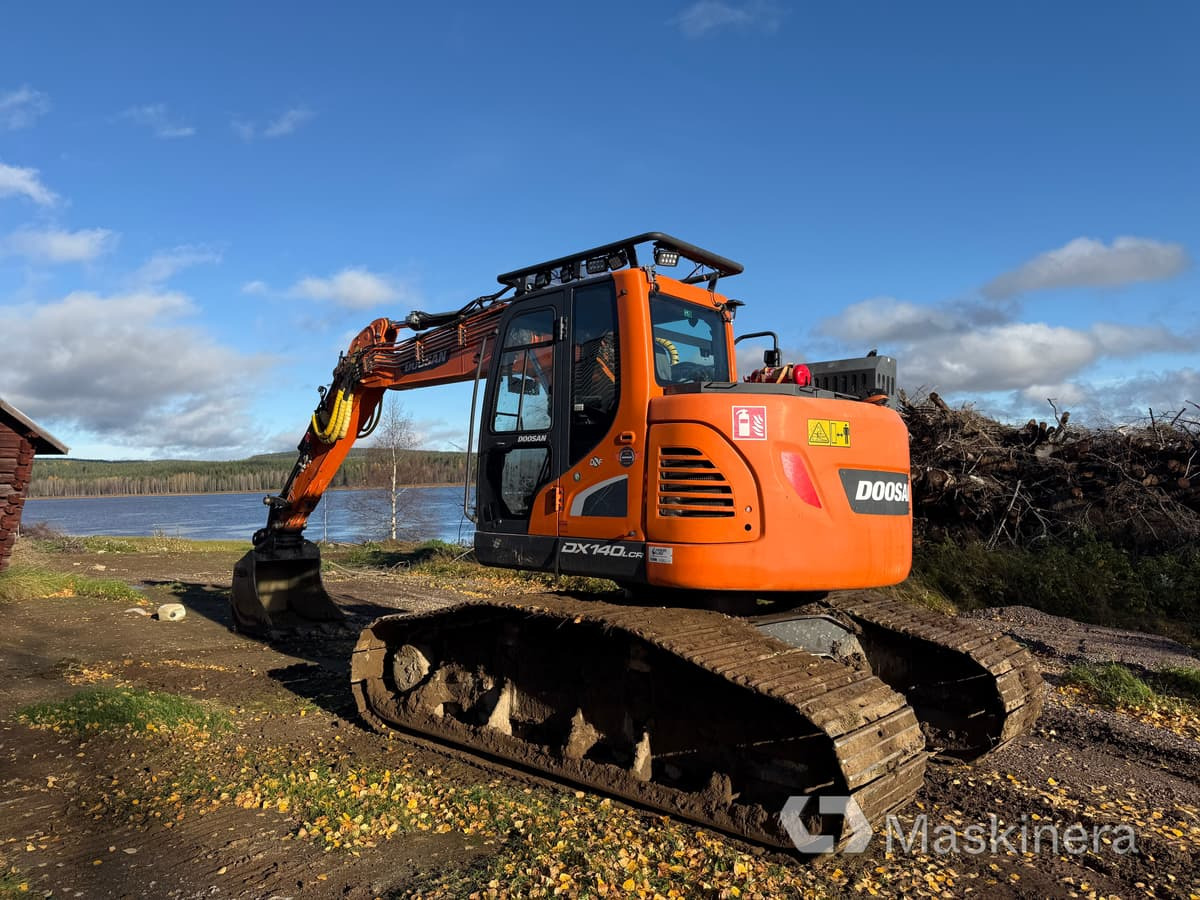 Grävmaskin Doosan DX140LCR-5 / Skördaraggregat 25RH - Vikšrinis ekskavatorius: foto 3 Grävmaskin Doosan DX140LCR-5 / Skördaraggregat 25RH - Vikšrinis ekskavatorius: foto 3