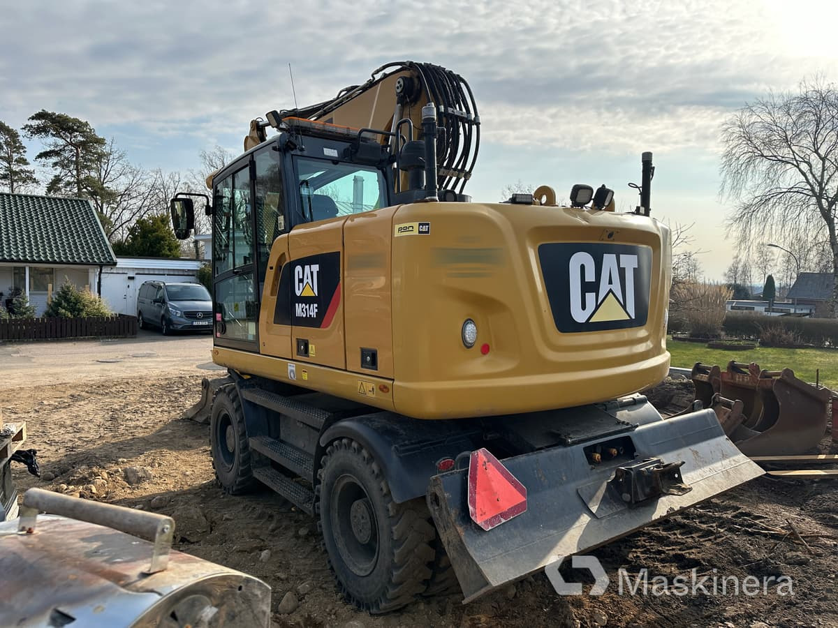 Hjulgrävare Cat M314F + redskap/vagn/grävsystem - Vikšrinis ekskavatorius: foto 4 Hjulgrävare Cat M314F + redskap/vagn/grävsystem - Vikšrinis ekskavatorius: foto 4