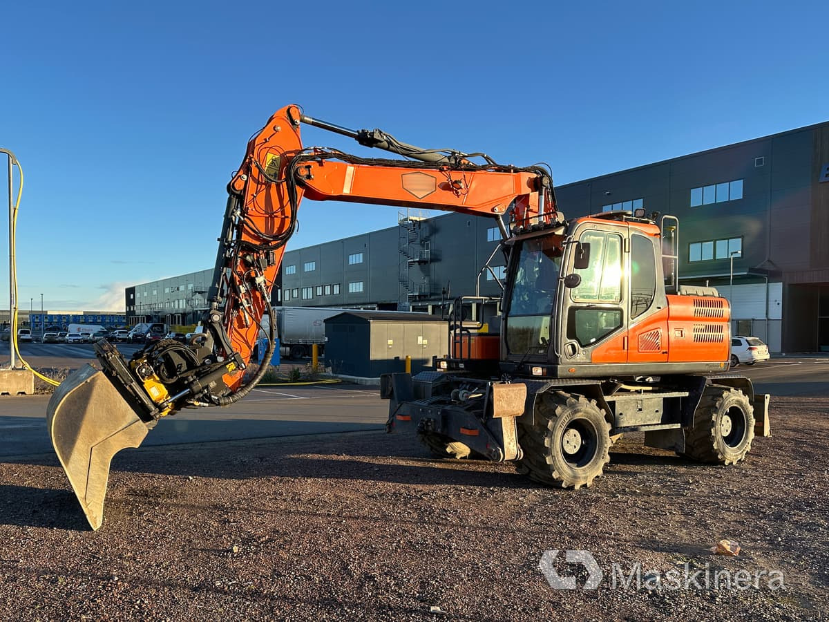 Hjulgrävare Doosan DX160W-5 - Vikšrinis ekskavatorius: foto 1 Hjulgrävare Doosan DX160W-5 - Vikšrinis ekskavatorius: foto 1