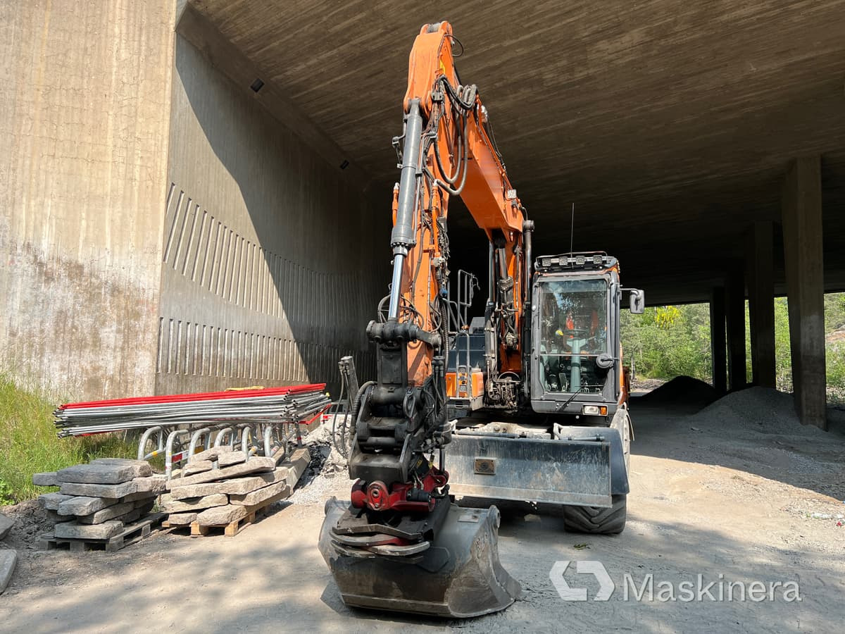 Hjulgrävare Doosan DX160W med tillbehör - Vikšrinis ekskavatorius: foto 2 Hjulgrävare Doosan DX160W med tillbehör - Vikšrinis ekskavatorius: foto 2