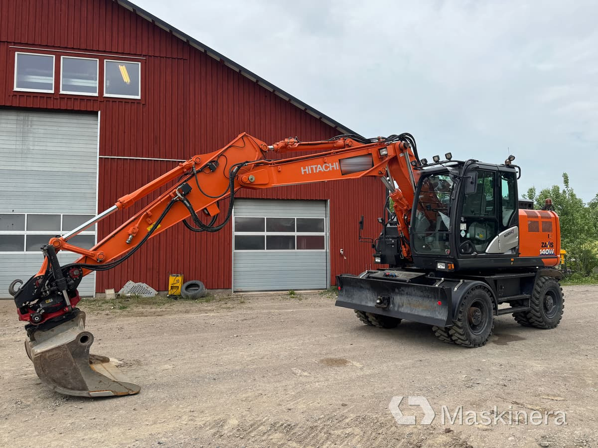 Hjulgrävare Hitachi Zaxis 140W med redskap - Vikšrinis ekskavatorius: foto 1 Hjulgrävare Hitachi Zaxis 140W med redskap - Vikšrinis ekskavatorius: foto 1