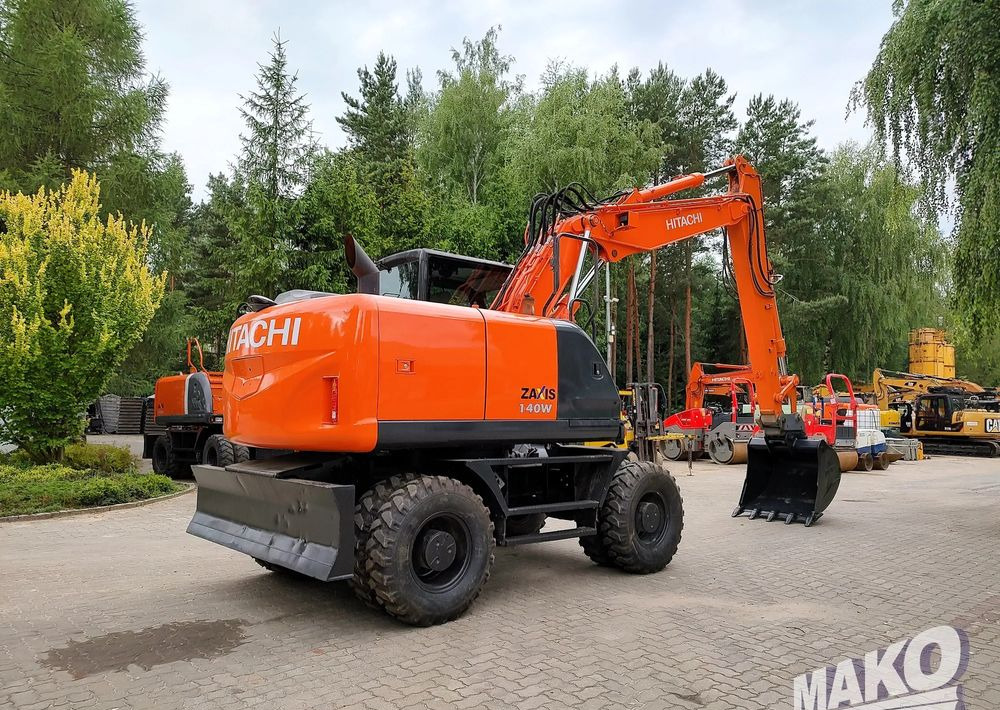Hitachi ZX 140 - Ratinis ekskavatorius: foto 4 Hitachi ZX 140 - Ratinis ekskavatorius: foto 4