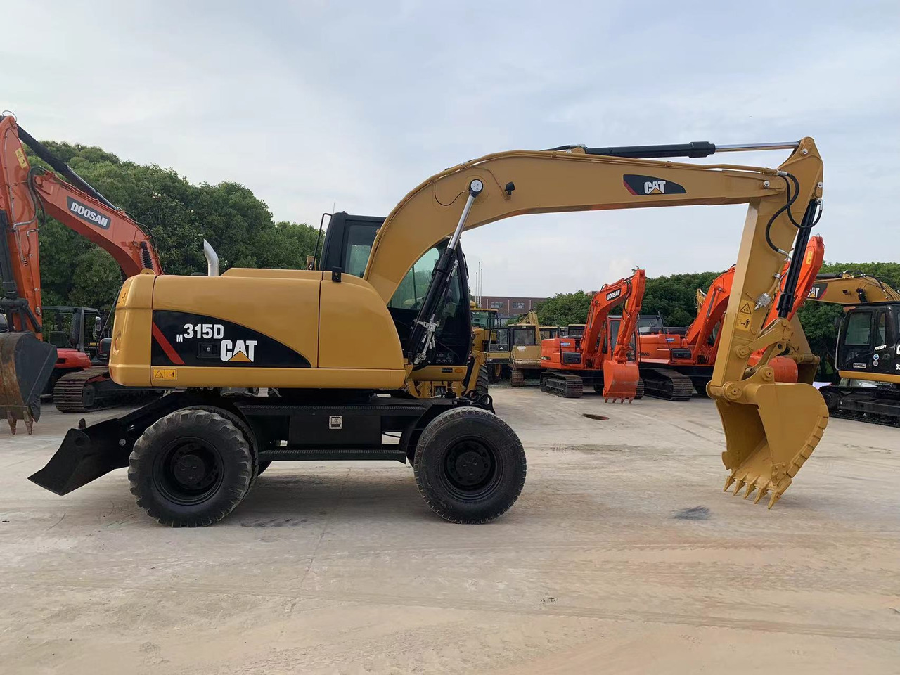 Caterpillar M315D Wheel Excavator Moving by Tires - Ratinis ekskavatorius: foto 1 Caterpillar M315D Wheel Excavator Moving by Tires - Ratinis ekskavatorius: foto 1