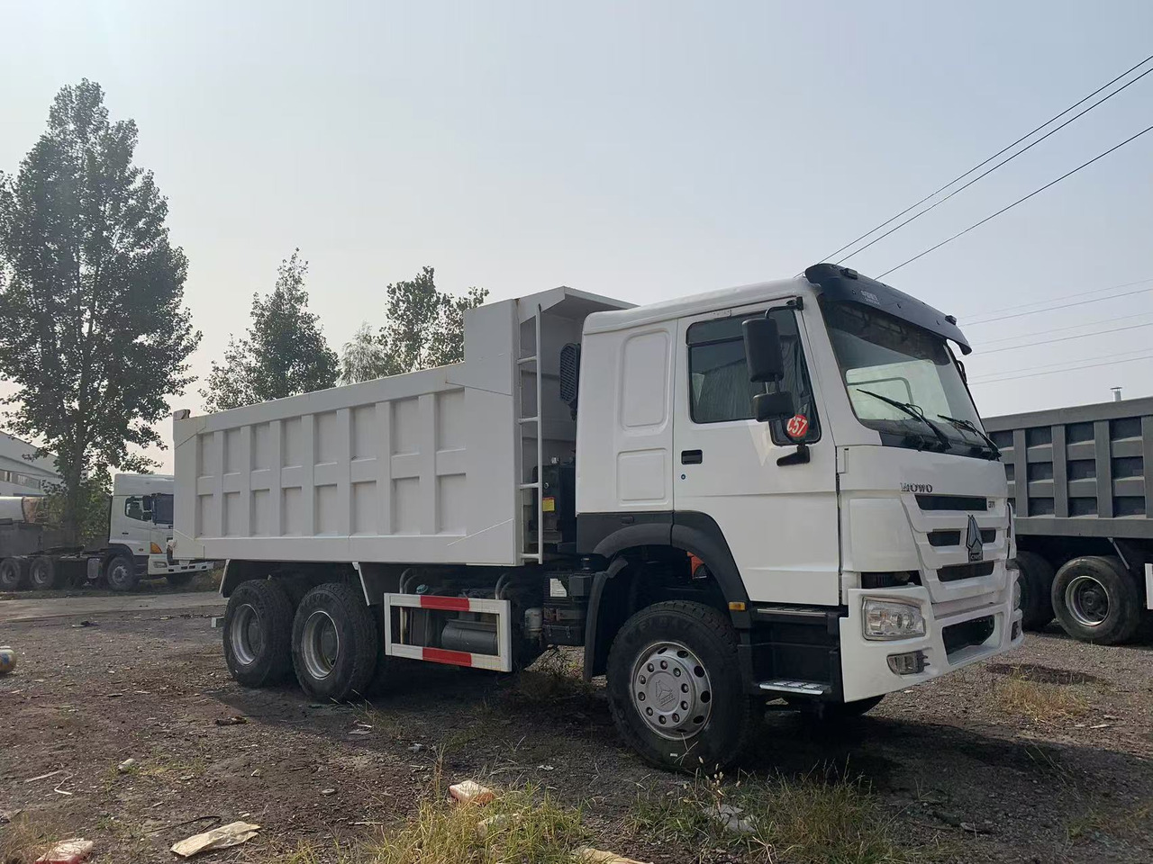 Howo Secondhand Commercial Vehicle 10-wheels HOWO Dumper Truck 6x4 Left Hand Drive Tipper Truck - Savivartis sunkvežimis: foto 4 Howo Secondhand Commercial Vehicle 10-wheels HOWO Dumper Truck 6x4 Left Hand Drive Tipper Truck - Savivartis sunkvežimis: foto 4