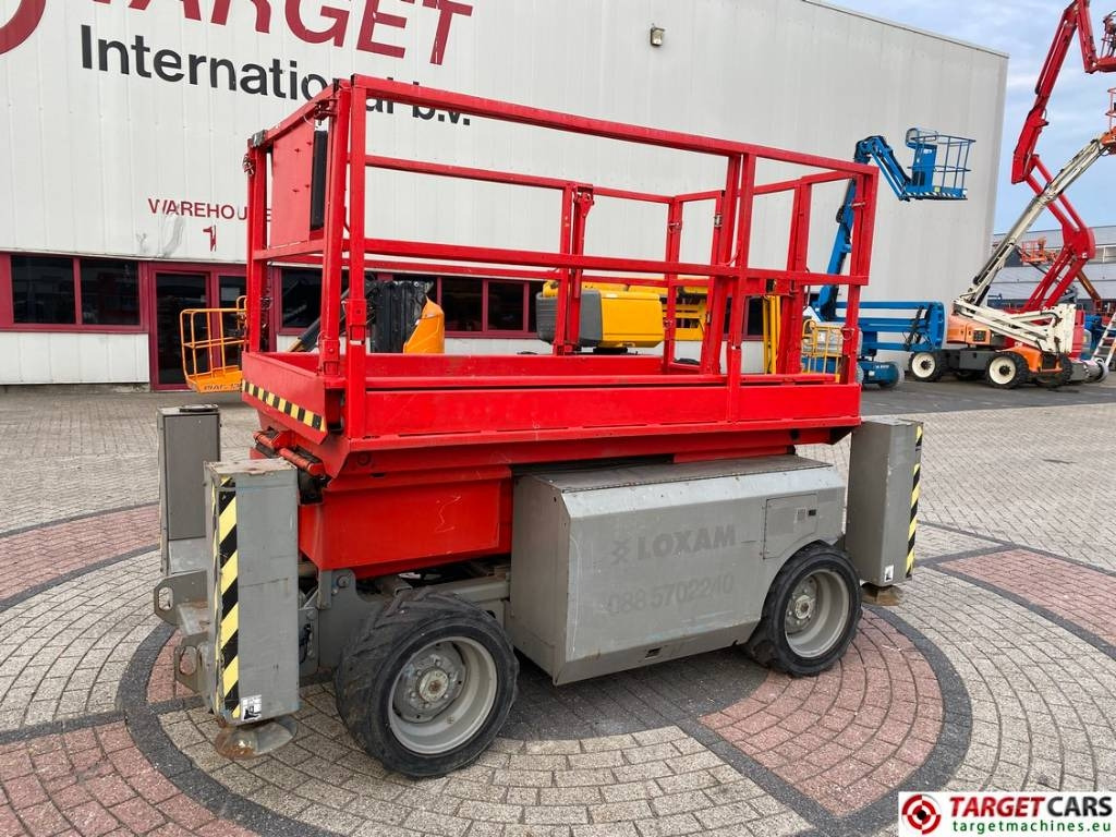 Genie GS-2668RT Diesel 4x4 Scissor Work Lift 992cm - Žirklinis keltuvas: foto 1 Genie GS-2668RT Diesel 4x4 Scissor Work Lift 992cm - Žirklinis keltuvas: foto 1