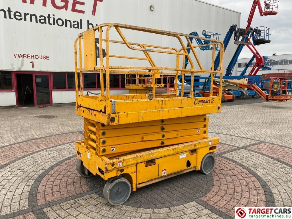 Haulotte Compact 12 Electric Scissor Work Lift 1200cm - Žirklinis keltuvas: foto 1 Haulotte Compact 12 Electric Scissor Work Lift 1200cm - Žirklinis keltuvas: foto 1