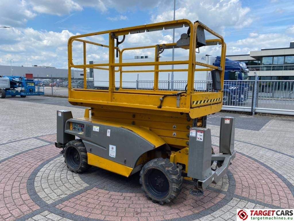Haulotte Compact 12DX Diesel 4x4 Scissor Work Lift 1206cm - Žirklinis keltuvas: foto 2 Haulotte Compact 12DX Diesel 4x4 Scissor Work Lift 1206cm - Žirklinis keltuvas: foto 2
